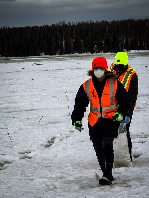 Warren Kadoya, a research physical scientist with the U.S. Army Engineer Research and Development Center’s Cold Regions Research and Engineering Laboratory (CRREL) and Sam Beal, a research chemist with CRREL, take multi-increment samples of snow as a background for munitions residues testing at Fort Richardson, Alaska.