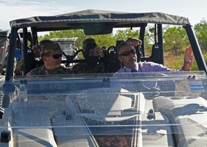 U.S. Army Col. Brendon Dever, 111th Military Intelligence Brigade commander, tours Forward Operating Base Sentinel, Goodfellow Air Force Base, Texas, August 9, 2022. FOB Sentinel is a simulated combat environment operated by the cadre of the 344th Military Intelligence Battalion as a capstone exercise for their students. (U.S. Air Force photo by Airman 1st Class Zachary Heimbuch)