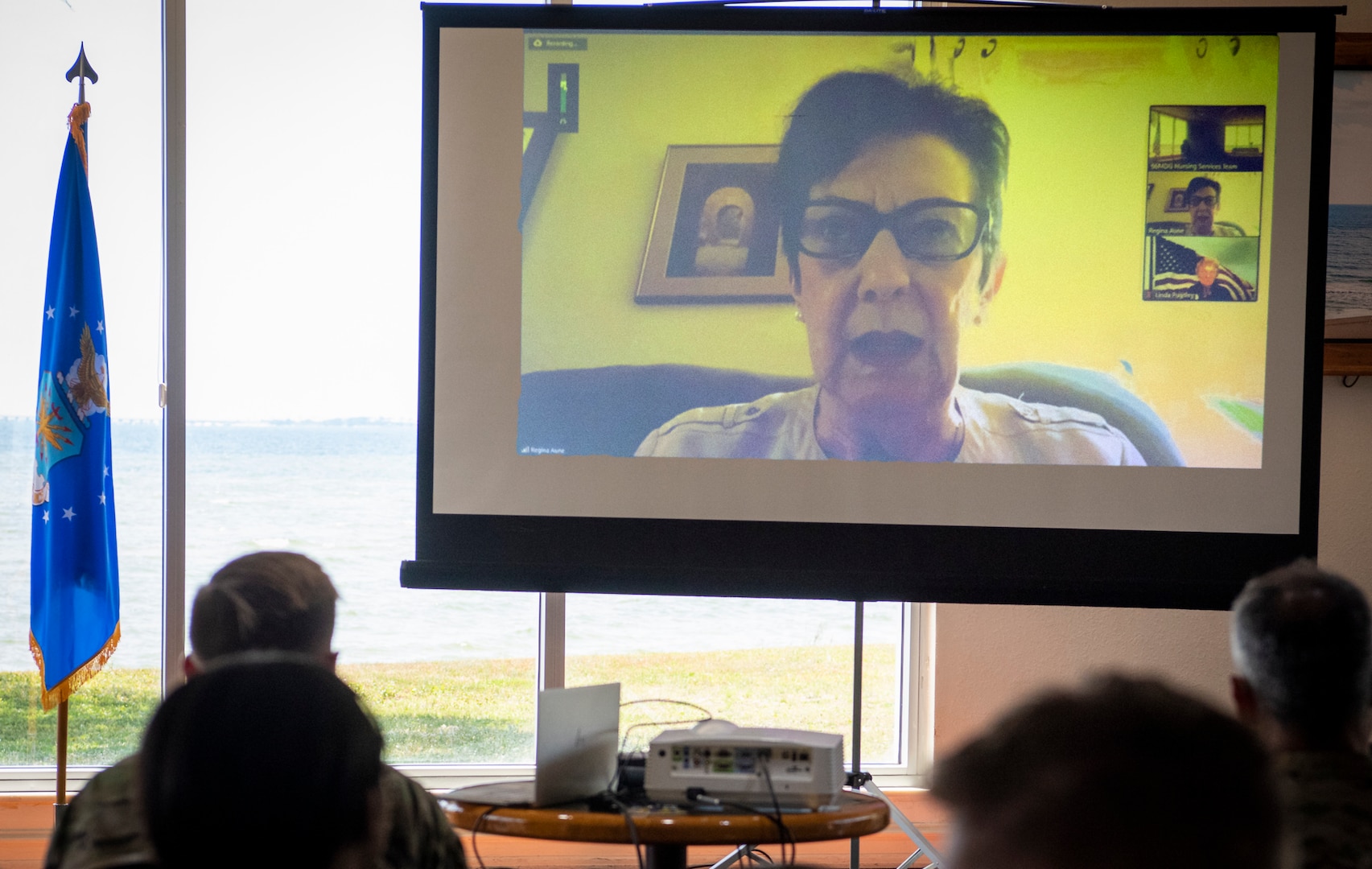Retired Col. Regina Aune speaks to 96th Medical Group personnel at a discussion panel May 9, 2022. Aune is a Vietnam-era flight nurse who spoke of her experiences in during Operation Babylift. The panel was part of the 96 MDG's opening ceremonies to Nurse Tech Week.