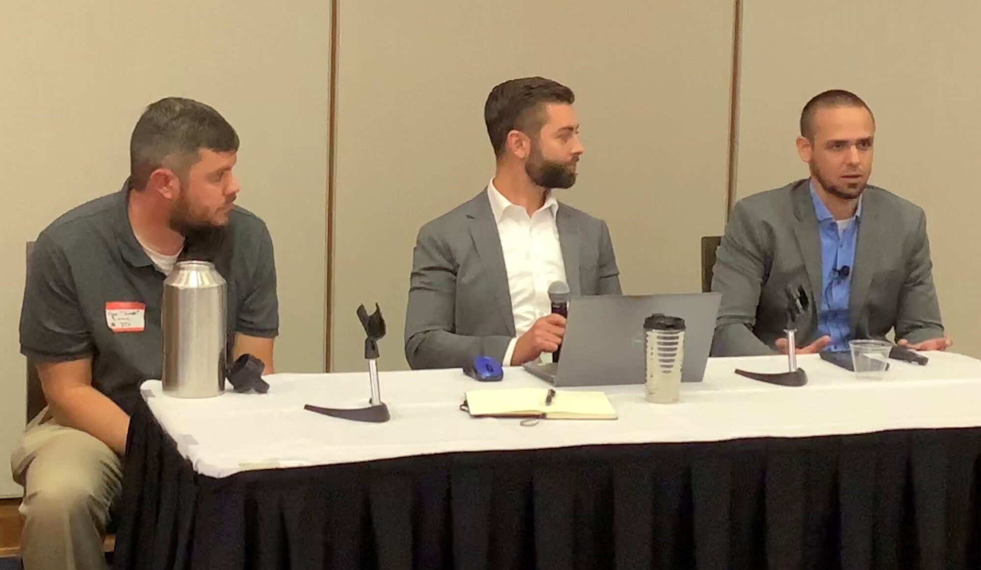 Photo of DTO team answering questions at summit
