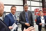 IMAGE: Mechanical engineer Lyn Thomas, left, updates Deputy Assistant Secretary of the Navy for Research, Development, Test and Engineering Dr. Brett Seidle, center, about the ongoing research into the hypersonic weapons program on Aug. 4. Adam Jones, head of advanced hypersonics and guided munitions, and Distinguished Engineer for Surface Engagement Systems Stephen Malyevac also briefed Seidle on his visit to the Hypersonic Research and Integration Facility for Surface Engagement during his tour of Naval Surface Warfare Center Dahlgren Division.