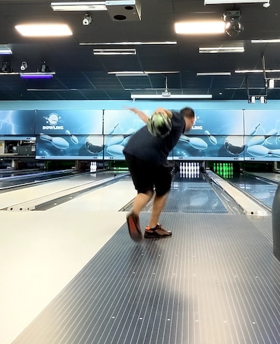 In 2022, Master Sgt. Andrew Davis takes time to practice work/life harmony by enjoying one of favorite hobbies, bowling.