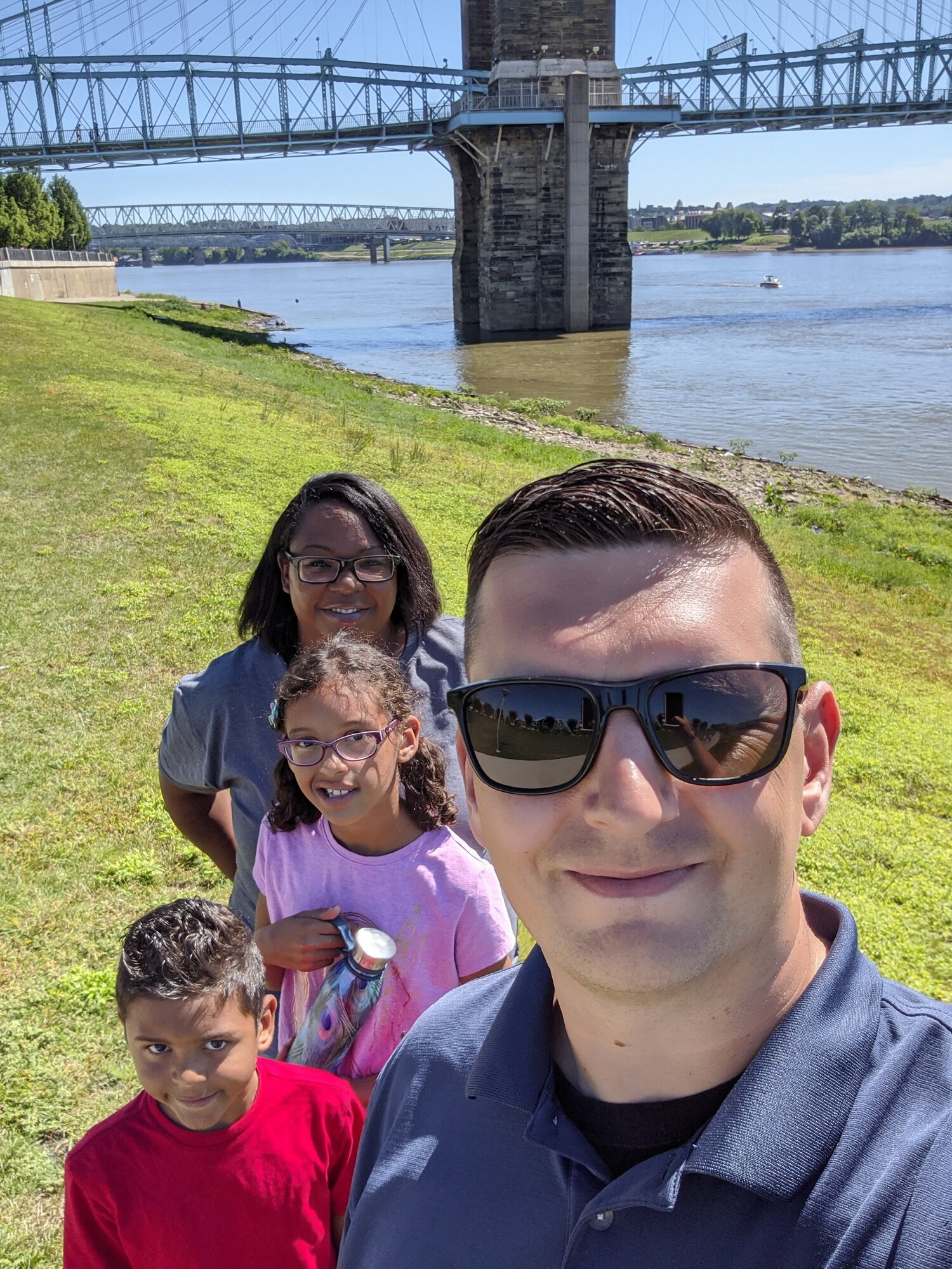 Master Sgt. Andrew Davis poses with his wife, daughter and son while spending some family time together in Cincinnati, Ohio.