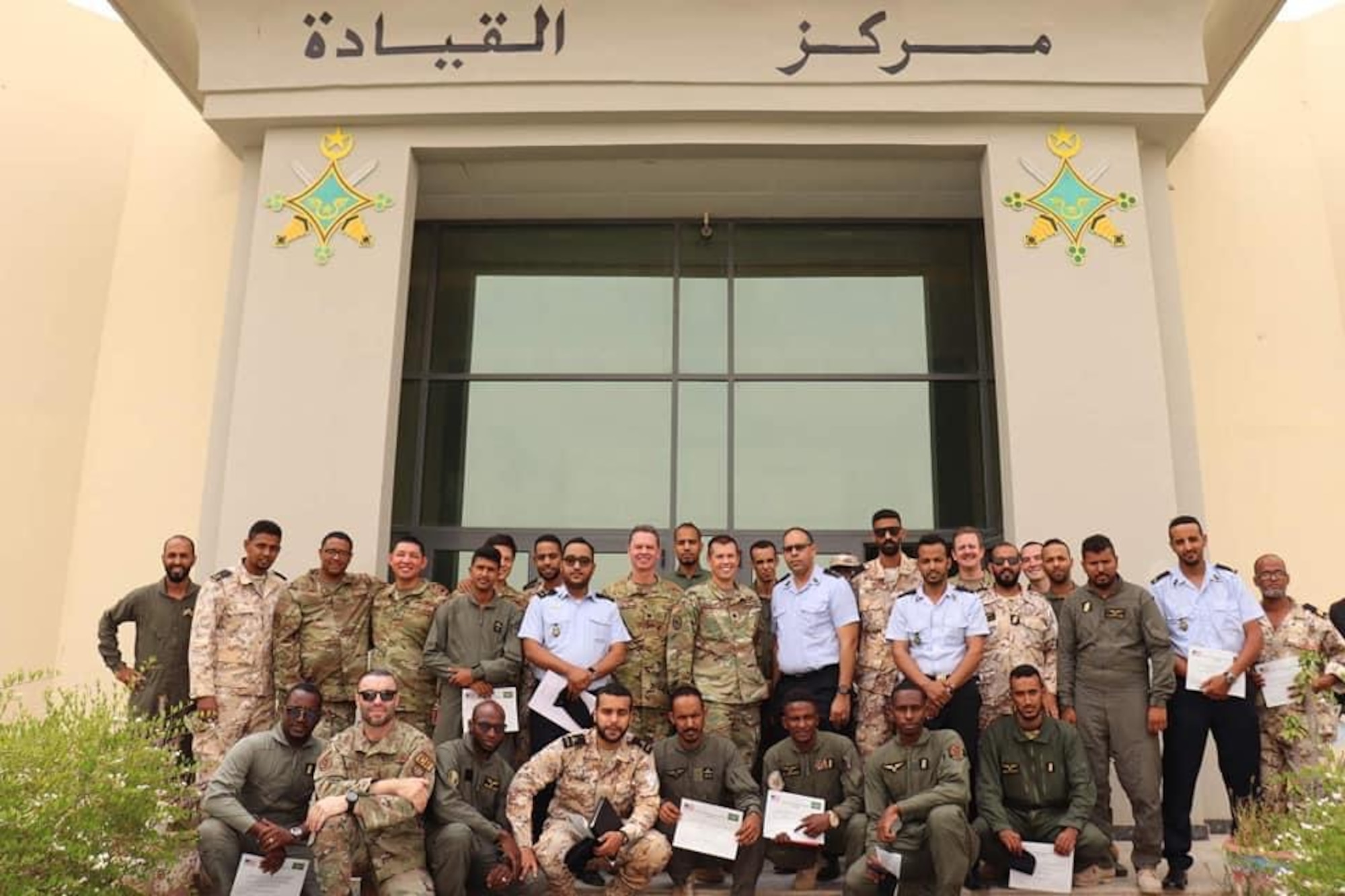 The 818th Mobility Support Advisory Squadron air advisors and Mauritanian Air Force students pose for a group photo following their graduation July 28, 2022, Nouakchott, Mauritania. Air advisors provided aircraft wiring fundamentals and aircrew ground training in support of the Mauritanian Air Force's AC-208 Combat Caravan program.