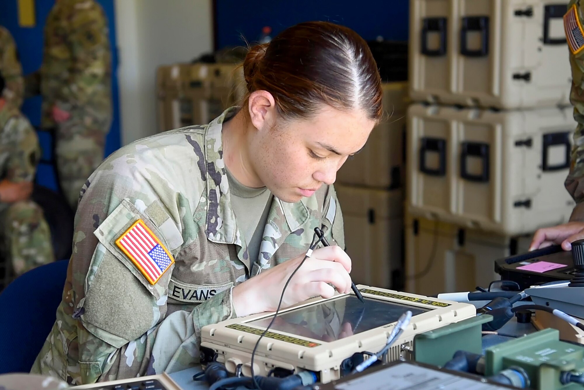 U.S. Army Pfc. Vicky Evans, 393rd Transportation Harbormaster Operations Detachment, 11th Transportation Battalion, conducts an operational test of a Joint Battle Command Platform console at Joint Base Langley-Eustis, Virginia, Aug. 4, 2022.
