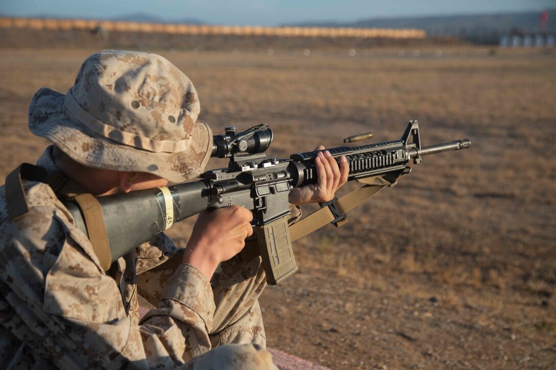 U.S. Marine Corps , a recruit with Golf Company, 2nd Recruit Training Battalion, shoots the table one course of fire at Marine Corps Base Camp Pendleton, California, Aug. 9, 2022. The table one course of fire covers the basic fundamentals of marksmanship and rifle safety. (Marine Corps photo by Lance Cpl. Hutchinson)