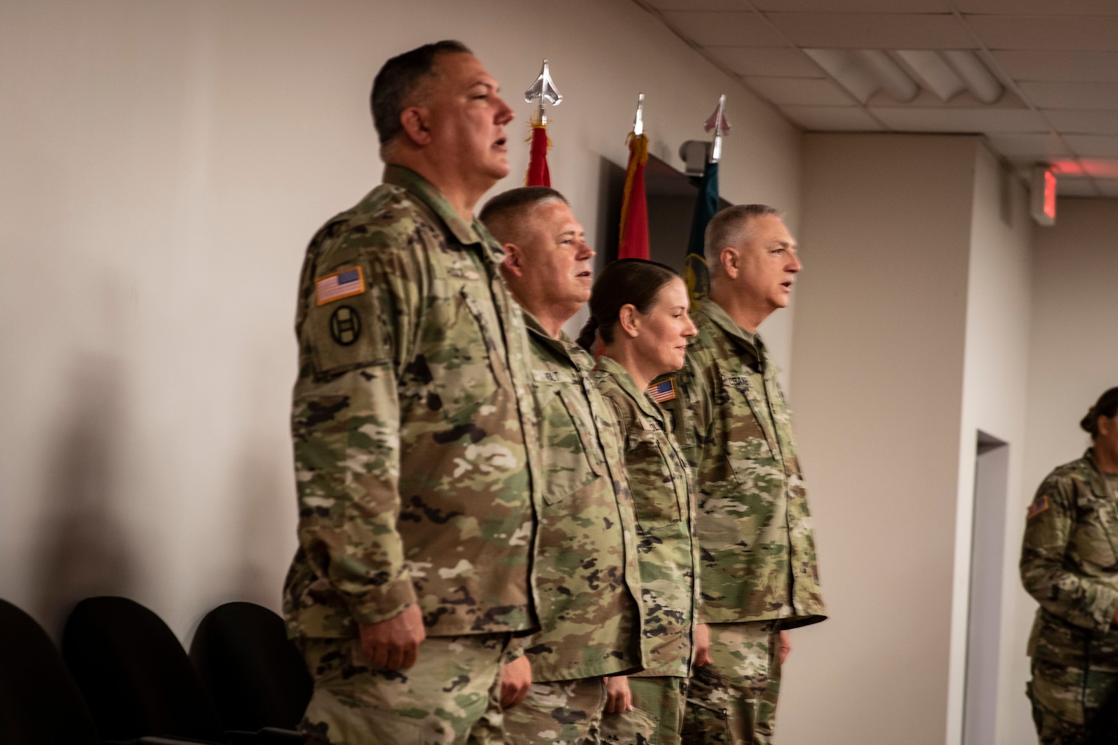 West Virginia Army National Guard Col. Mark B. Houck relinquished command of the Army Interagency Training and Education Center (AITEC) to Lt. Col. Gina M. Nichols during a ceremony at AITEC headquarters in St. Albans, West Virginia, Aug. 9, 2022. From left to right are pictures: Col. Mark B. Houck, Brig. Gen. Gene Holt,  Lt. Col. Gina M. Nichols, Maj. Gen. William Crane.
