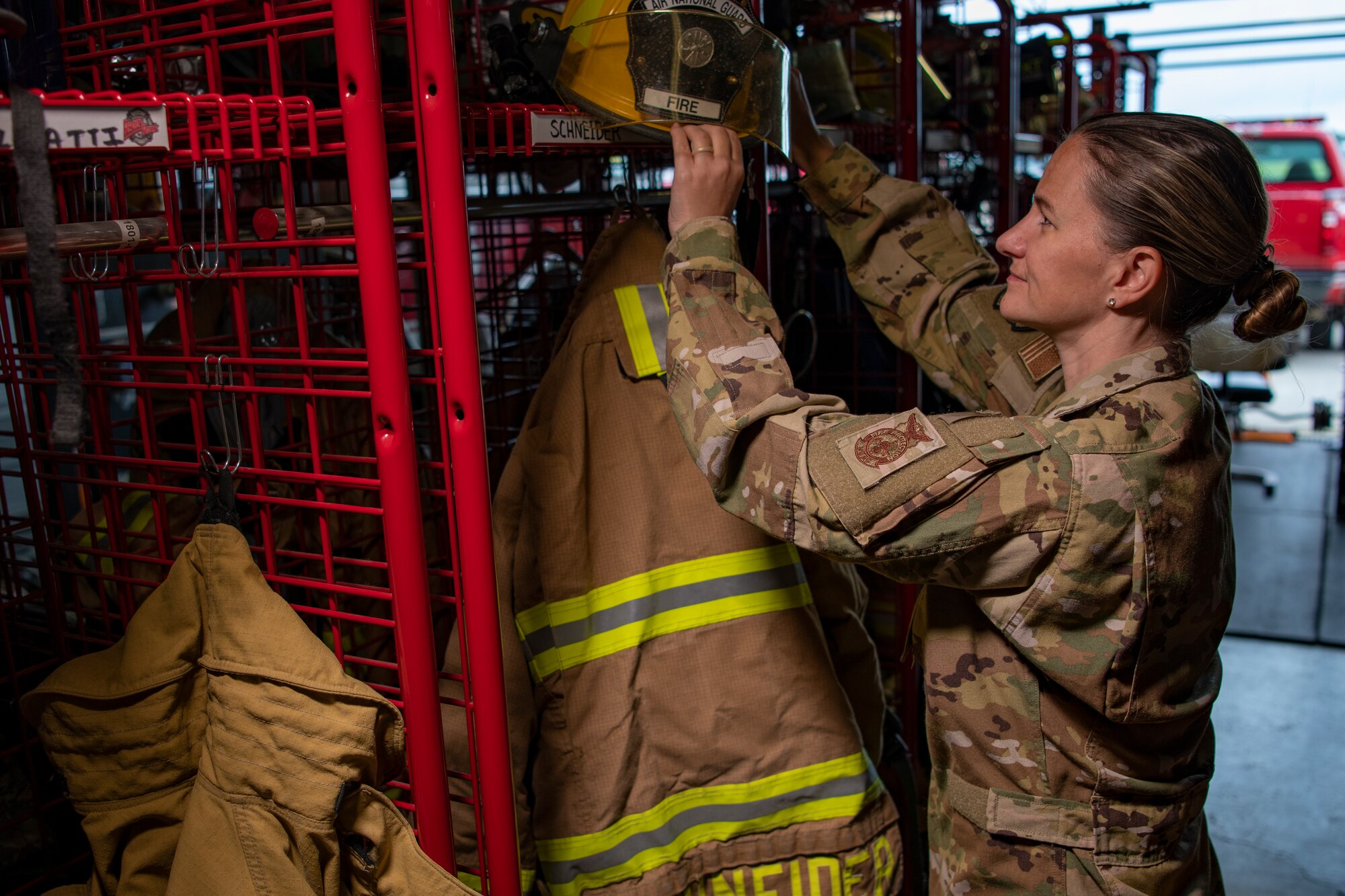 Senior Airman Kristina Schneider, fire protection journeyman, poses for a portrait July 27, 2022, at the 179th Airlift Wing at Mansfield Lahm ANGB, Ohio. Schneider was selected based on superior leadership, job performance, and personal achievements.