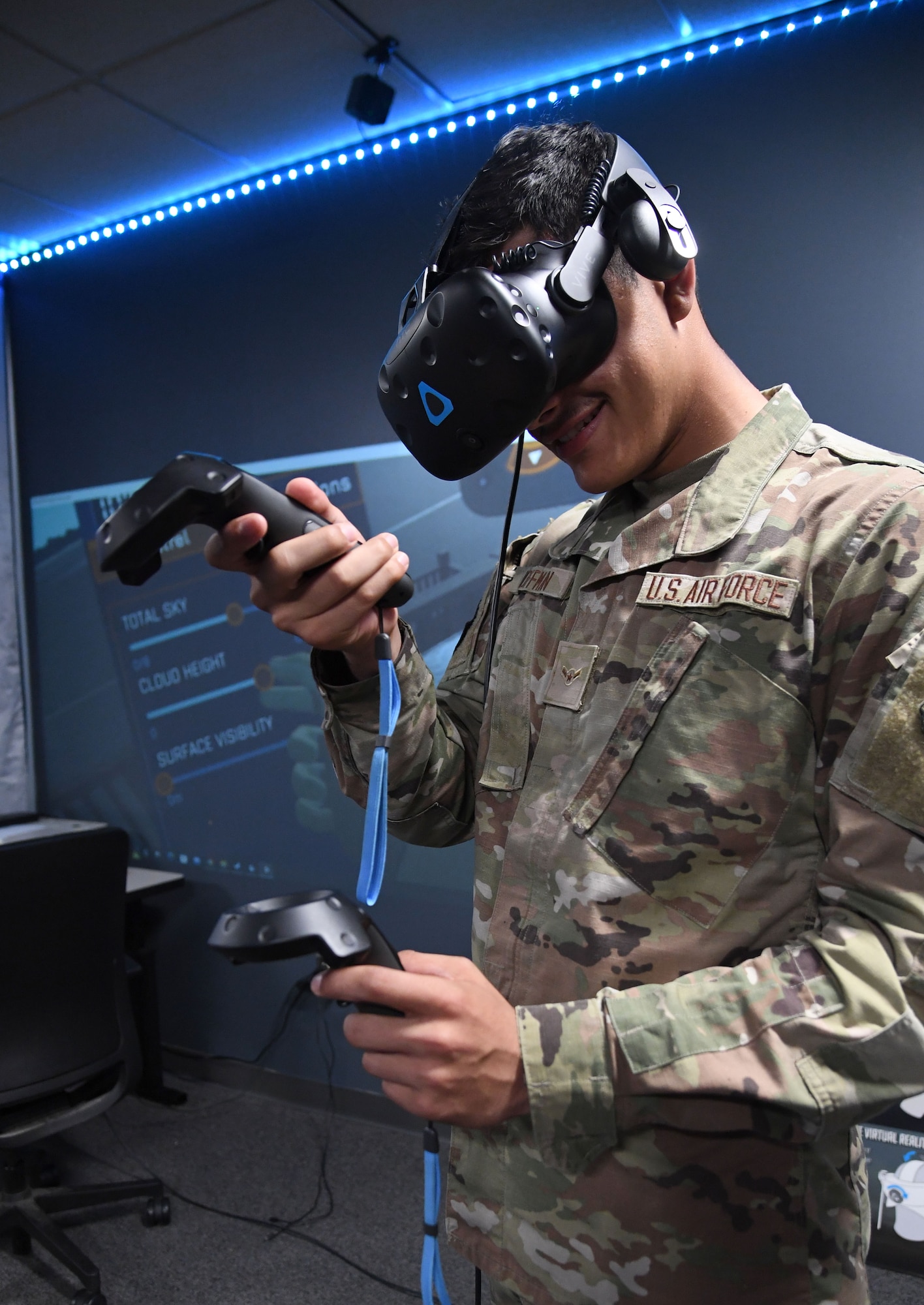 U.S. Air Force Airman Gabriel Hoffman, 335th Training Squadron student, participates in a virtual reality training session during the weather initial skills course inside of the Joint Weather Training Facility at Keesler Air Force Base, Mississippi, July 21, 2022. The weather apprentice course, which graduated 650 students this past year, takes 151 academic days to complete. Approximately 7,400 students go through the 335th TRS's 13 Air Force Specialty Codes each year. (U.S. Air Force photo by Kemberly Groue)