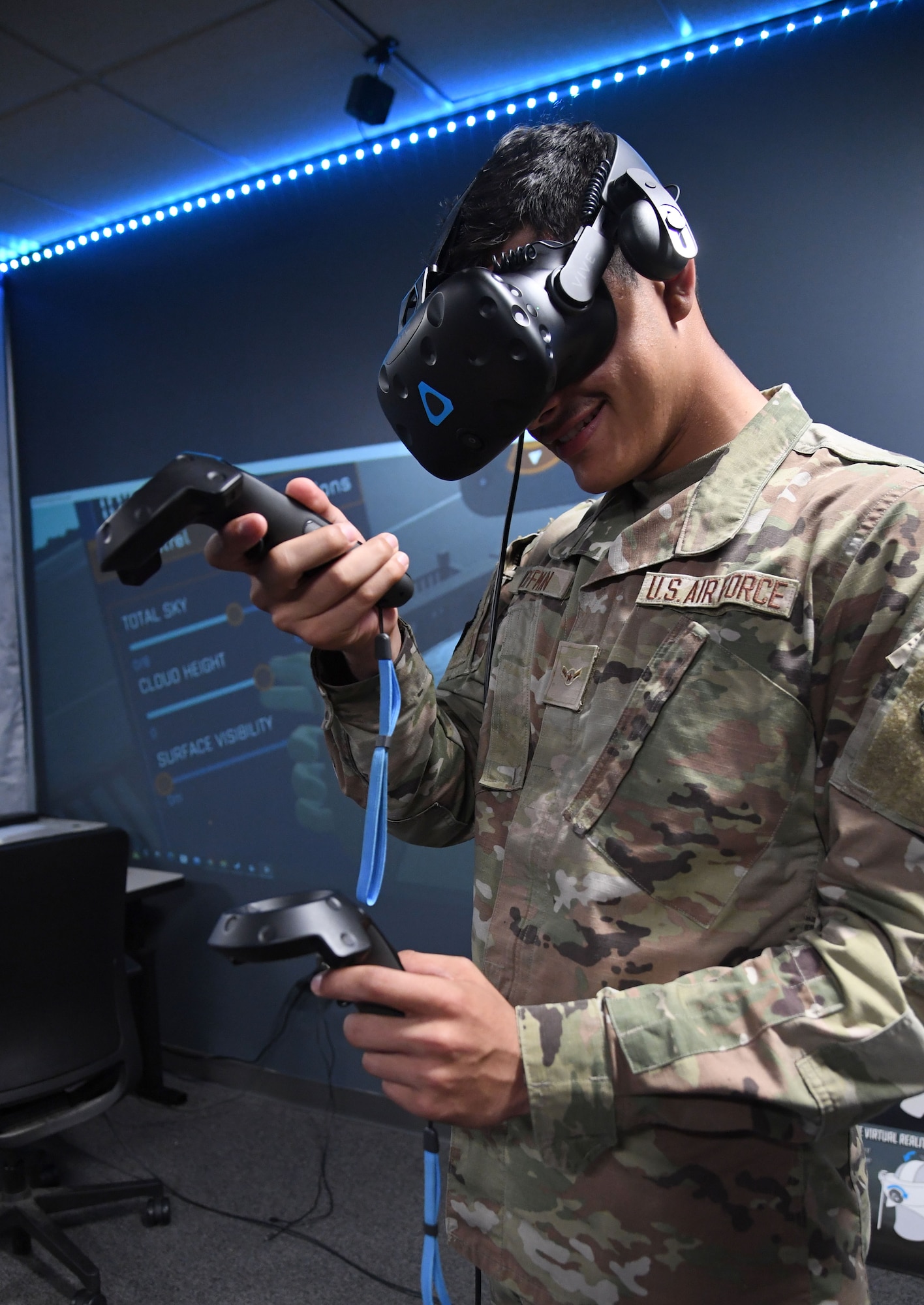 U.S. Air Force Airman Gabriel Hoffman, 335th Training Squadron student, participates in a virtual reality training session during the weather initial skills course inside of the Joint Weather Training Facility at Keesler Air Force Base, Mississippi, July 21, 2022. The weather apprentice course, which graduated 650 students this past year, takes 151 academic days to complete. Approximately 7,400 students go through the 335th TRS's 13 Air Force Specialty Codes each year. (U.S. Air Force photo by Kemberly Groue)