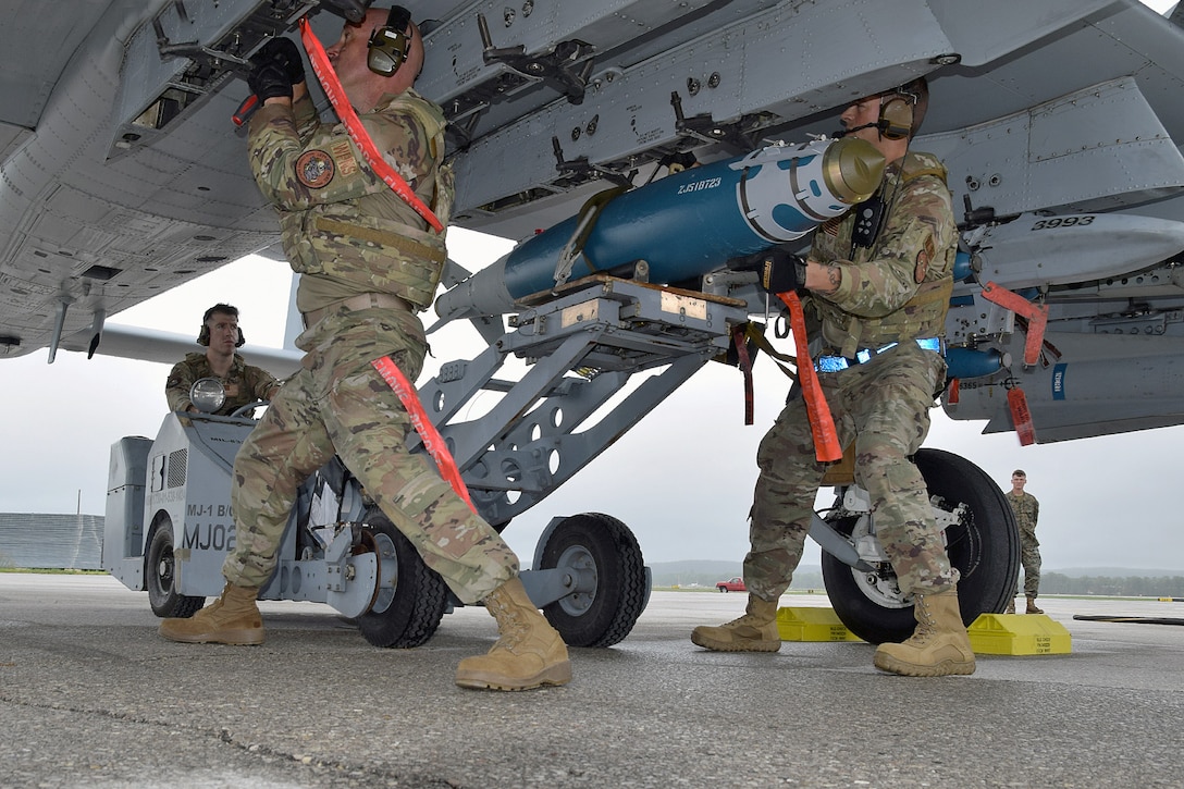 U. S. Air Force Airmen from the 127th Aircraft Maintenance Squadron, Selfridge Air National Guard Base, (SANGB) Mich. perform Agile Combat Employment (ACE) training while loading bombs onto an A-10 Thunderbolt II also from SANGB during an Integrated Combat Turn (ICT) during Northern Agility 22-2/Northern Strike 22, at Cherry Capital Airport in Traverse City, Mich., Aug. 8, 2022.