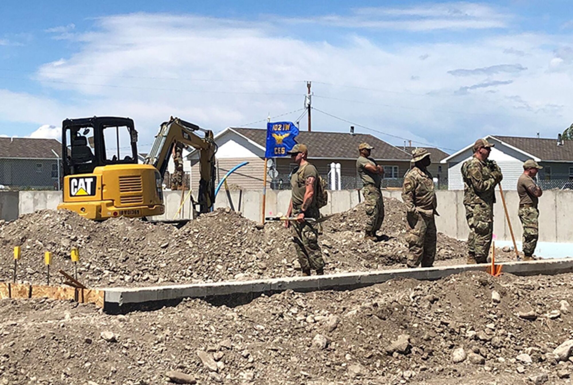 Several 102nd Civil Engineer Squadron Airmen perform construction work while deployed to this year’s Air National Guard Civil Engineer Innovative Readiness Training being held in Montana.