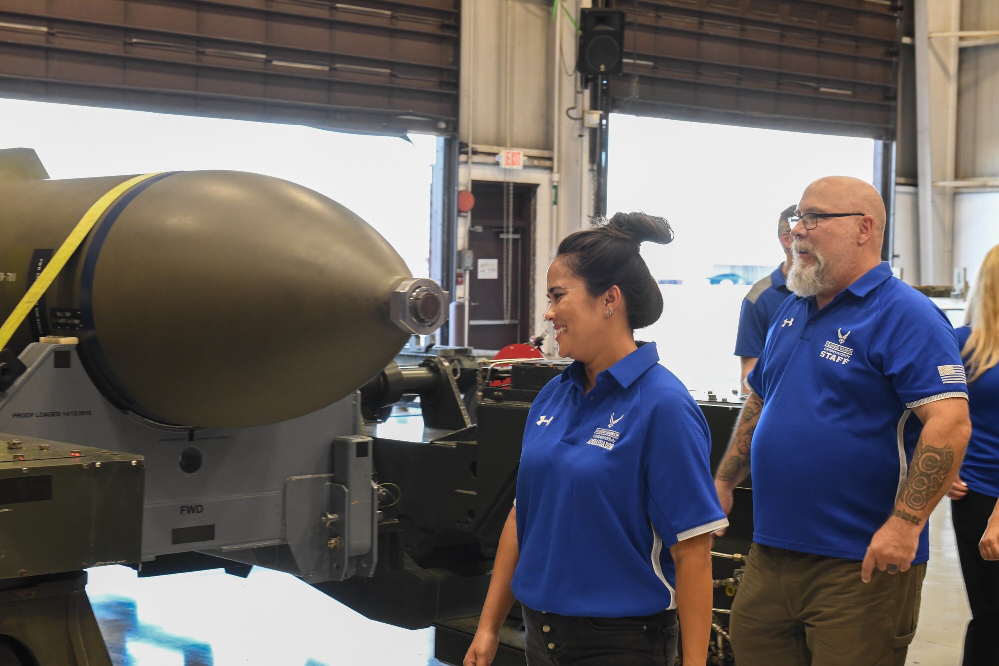 Ambassadors and staff members with the Wounded Warrior Project tour the Weapons Load Trainer facility at Whiteman Air Force Base, Missouri, August 9, 2022. Visiting work-centers around the installation assists the Air Force Wounded Warrior Project form connections with a variety of service members and increases awareness of the services they offer.
