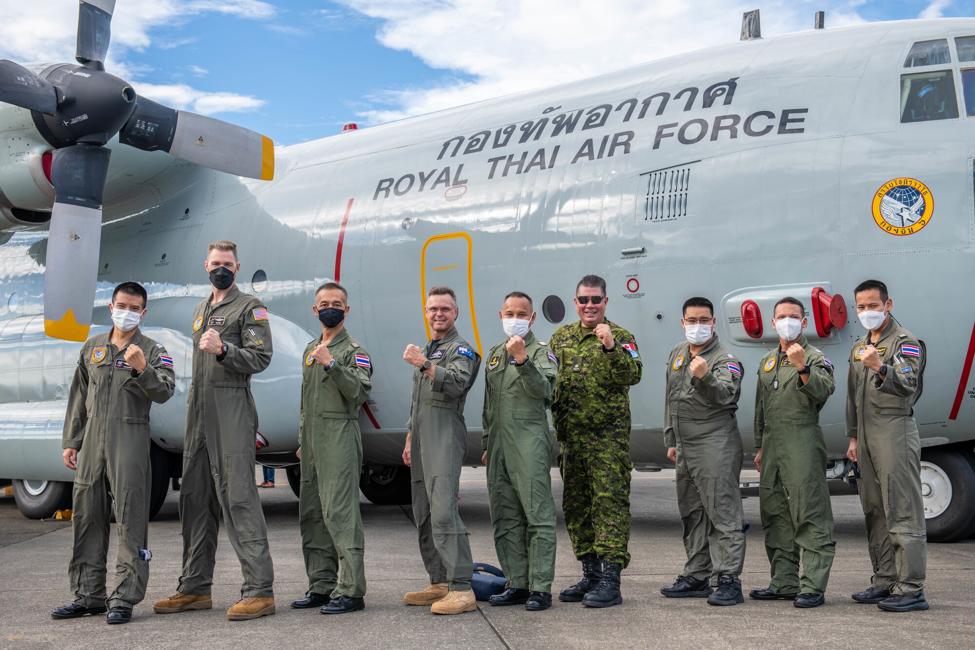 UNC-R and RTAF representatives pose for a group photo