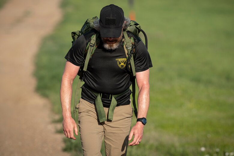 Man rucking with gear