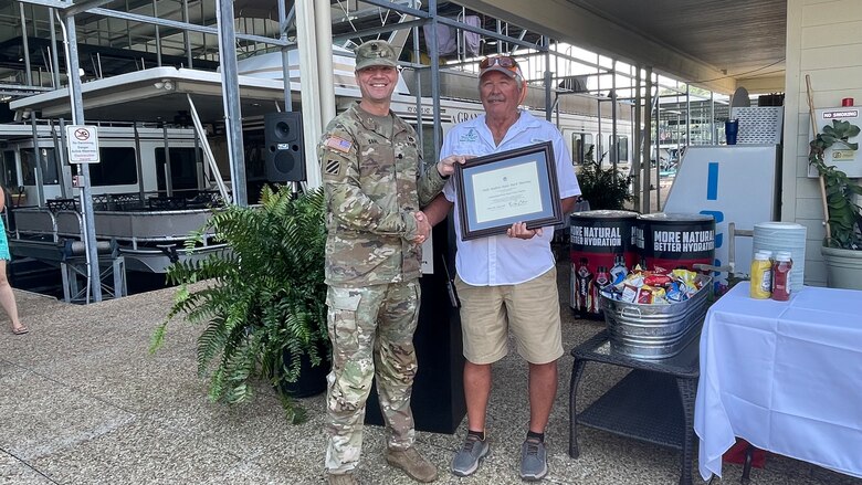 Nashville District Commander Lt. Col. Joseph Sahl presents Dale Hollow State Park Marina General Manager Glen Stone with the Clean Marina certificate at the Dale Hollow State Park Marina in Burkesville, Kentucky. The award ceremony was held on Aug. 6, 2022.