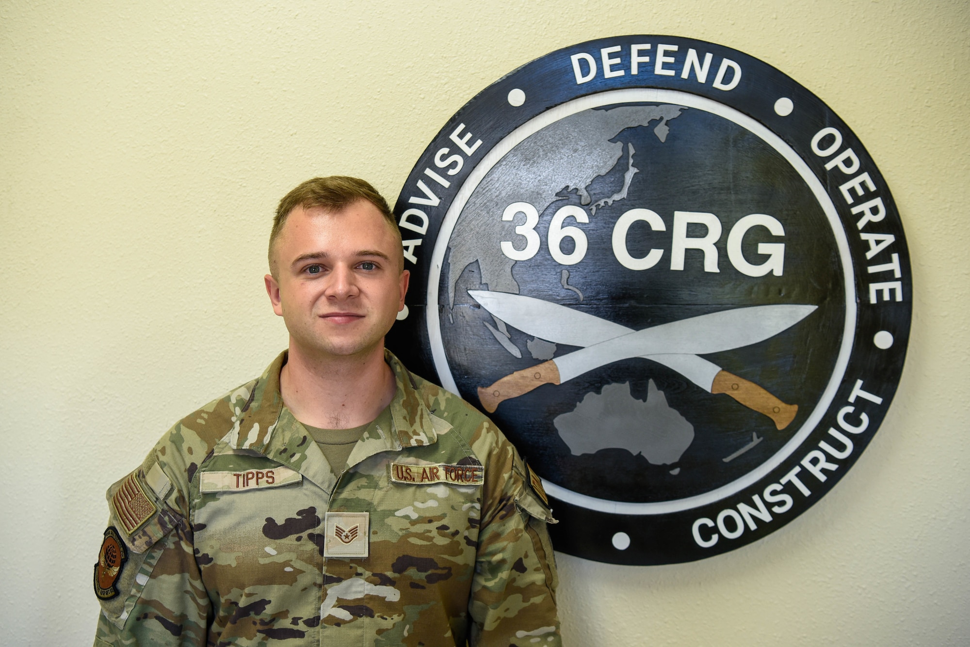 U.S. Air Force Staff Sgt. Finn Tipps, an independent duty medical technician assigned to the 36th Contingency Response Support Squadron, poses for a photo on August 8, 2022, at Andersen Air Force Base, Guam. The troop combat casualty care skills Tipps has learned from the Air Force, allowed him to know how to provide care to a civilian in an off-base incident. (U.S. Air Force Photo by Airman 1st Class Allison Martin)