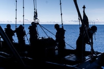 PHILIPPINE SEA (Aug 13, 2022) Sailors assigned to the U.S. Navy’s only forward-deployed aircraft carrier USS Ronald Reagan (CVN 76) prepare to lower a rigid-hull inflatable boat into the sea during small boat operations in the Philippine Sea, Aug. 13. Ronald Reagan’s rigid-hull inflatable boats are able to perform tasks including at sea rescue operations. Ronald Reagan, the flagship of Carrier Strike Group 5, provides a combat-ready force that protects and defends the United States, and supports alliances, partnerships and collective maritime interests in the Indo-Pacific region. (U.S. Navy photo by Mass Communication Specialist 2nd Class Keyly Santizo)