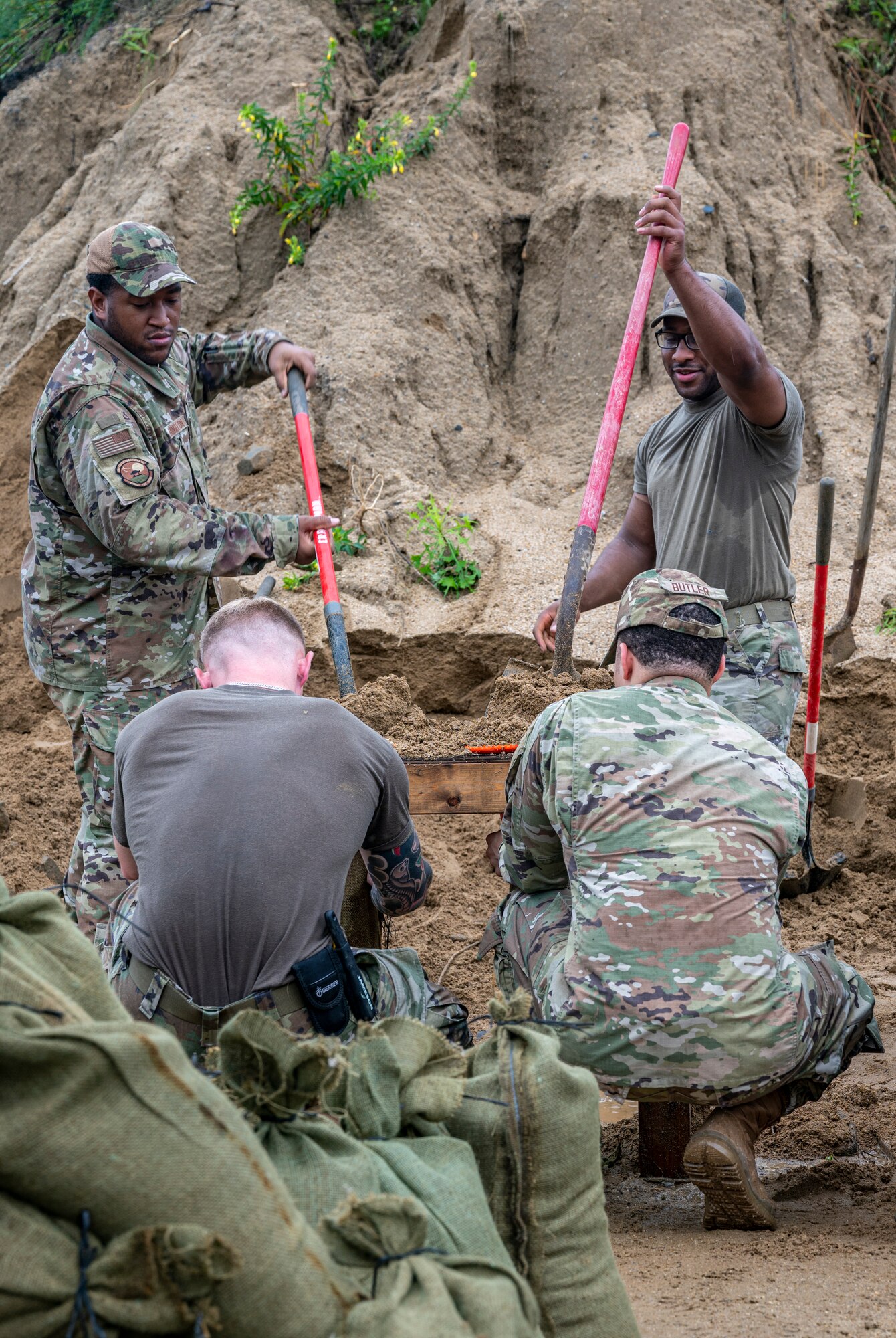 Airmen assigned to the 51st Fighter Wing fill sandbags at Osan Air Base, Republic of Korea, Aug. 9, 2022.