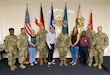 The commanding general of U.S. Army Sustainment Command visited the 405th Army Field Support Brigade headquarters Aug. 12 on Daenner Kaserne in Kaiserslautern, Germany, and received a brigade operations and capabilities in-brief. Army Maj. Gen. David Wilson also took the time during his visit to the brigade to present ASC commander’s coins for excellence to several 405th AFSB Soldiers and Civilian employees.