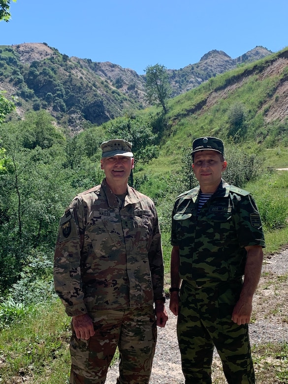 Maj. Gen. Wendul Hagler, Deputy Commanding General, U.S. Army Central, and  Maj. Gen. Jahondgir Nazaralizoda, acting commander, Republic of Tajikistan Mobile Forces, tour the Romit-Magob Training Center, Tajikistan, May 24, 2022.