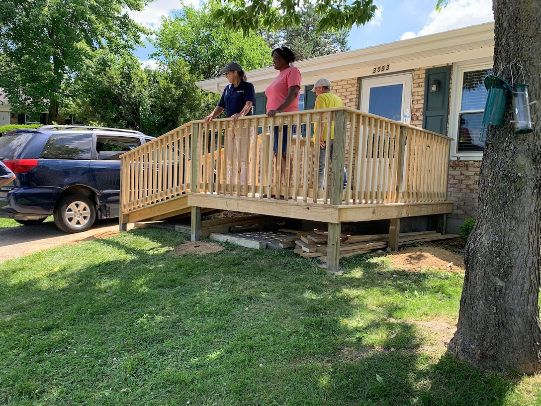 Several Kentucky National Guard Soldiers, as well as, a few civilians, donated their time to help build a needed ramp so Spc. Akir Jackson could access his home with his new electrical wheelchair.