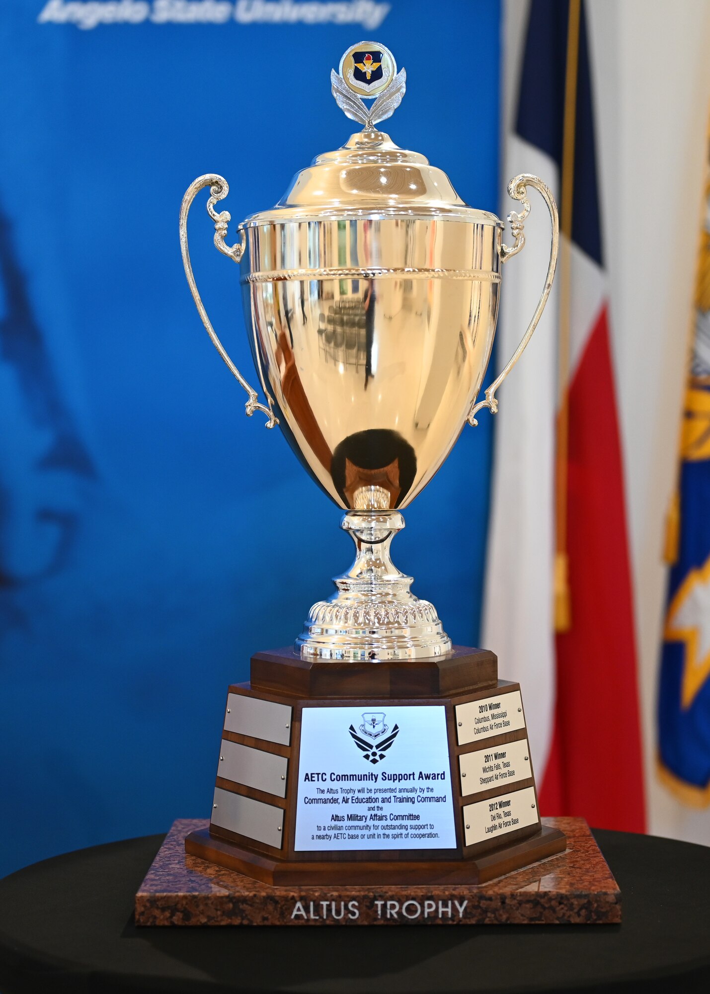 The Altus Trophy sits on display at the Mayer Museum, San Angelo, Texas, Aug. 11, 2022. The Altus Trophy is an annual award given to a community that provides outstanding support for an Air Education and Training Command installation. (U.S. Air Force photo by Senior Airman Ethan Sherwood)