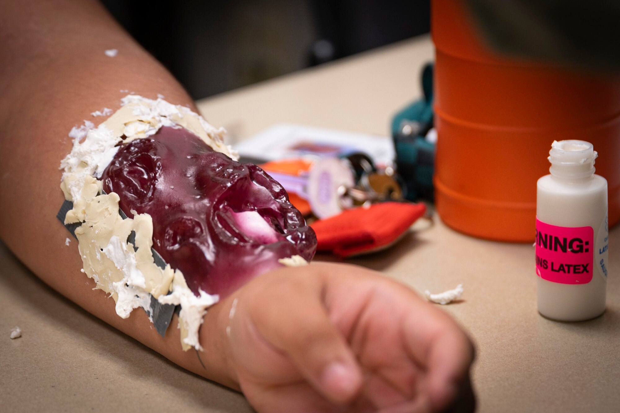 A fake wound is created during the Massive Accident Response Exercise Aug. 22, 2022, at Hurlburt Field, Florida.