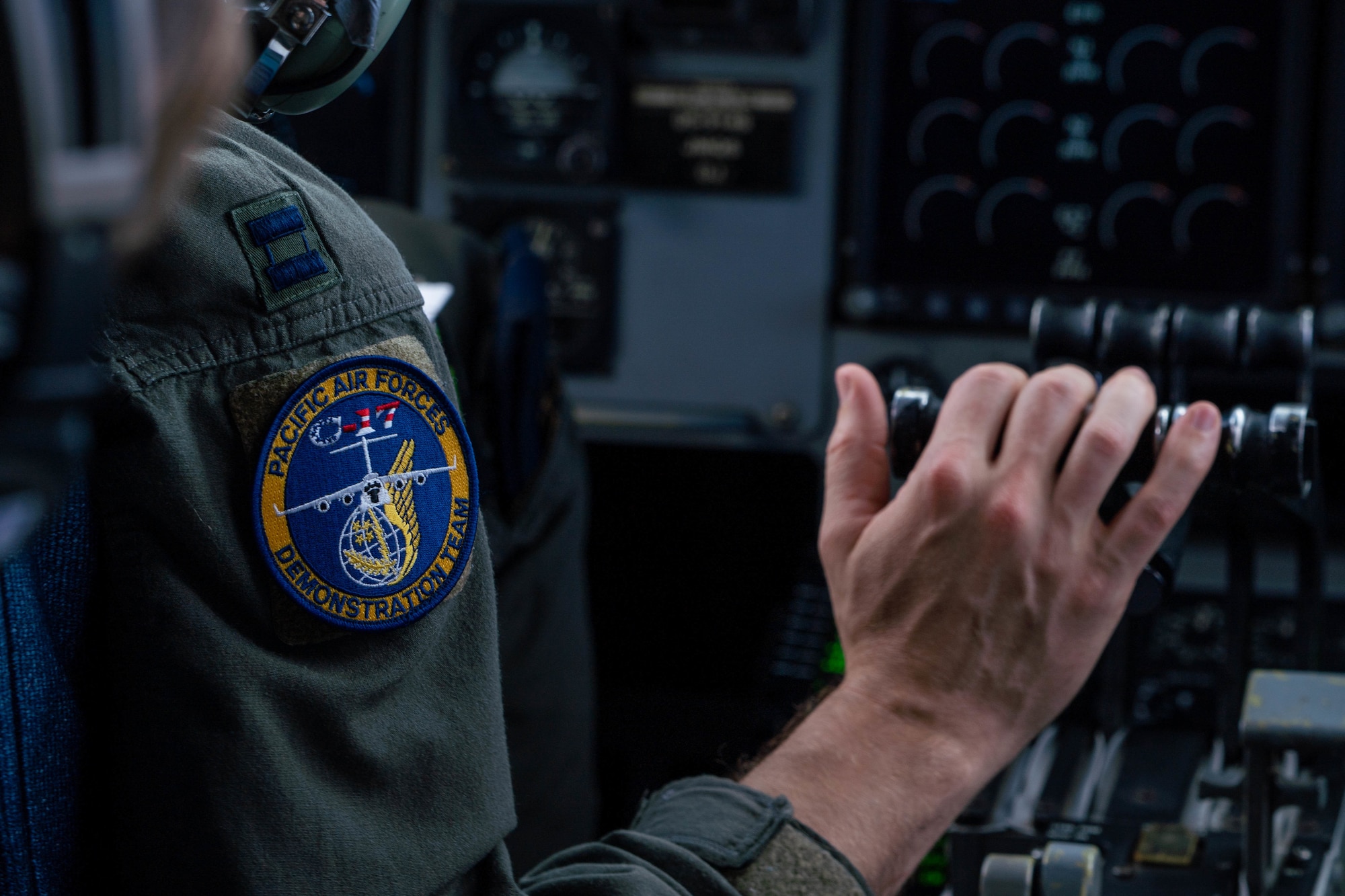 U.S. Air Force Capt. Christopher Abrahamsen, 535th Airlift Squadron instructor pilot conducts a preflight check before performing a C-17 Globemaster III demonstration at the Kaneohe Bay Air show at Joint Base Pearl Harbor-Hickam, Hawaii, Aug. 12, 2022. The air show featured static displays, aerial performances and aircraft demonstrations to show appreciation for the support given by the local community. (U.S. Air Force photo by Senior Airman Makensie Cooper)