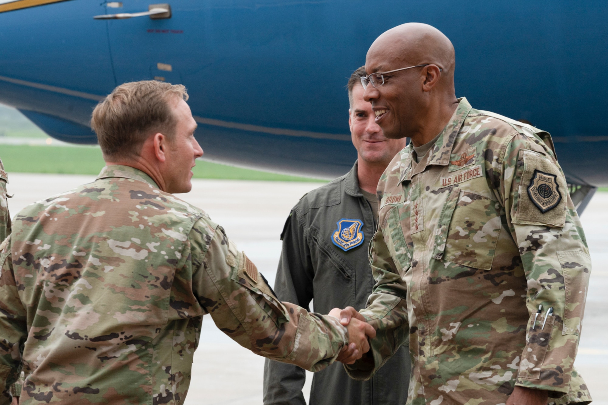 Air Force Chief of Staff Gen. CQ Brown, Jr. shakes hands with 51st Fighter Wing Vice Commander, Col. Paul Davidson, at Osan Air Base, Republic of Korea, Aug.