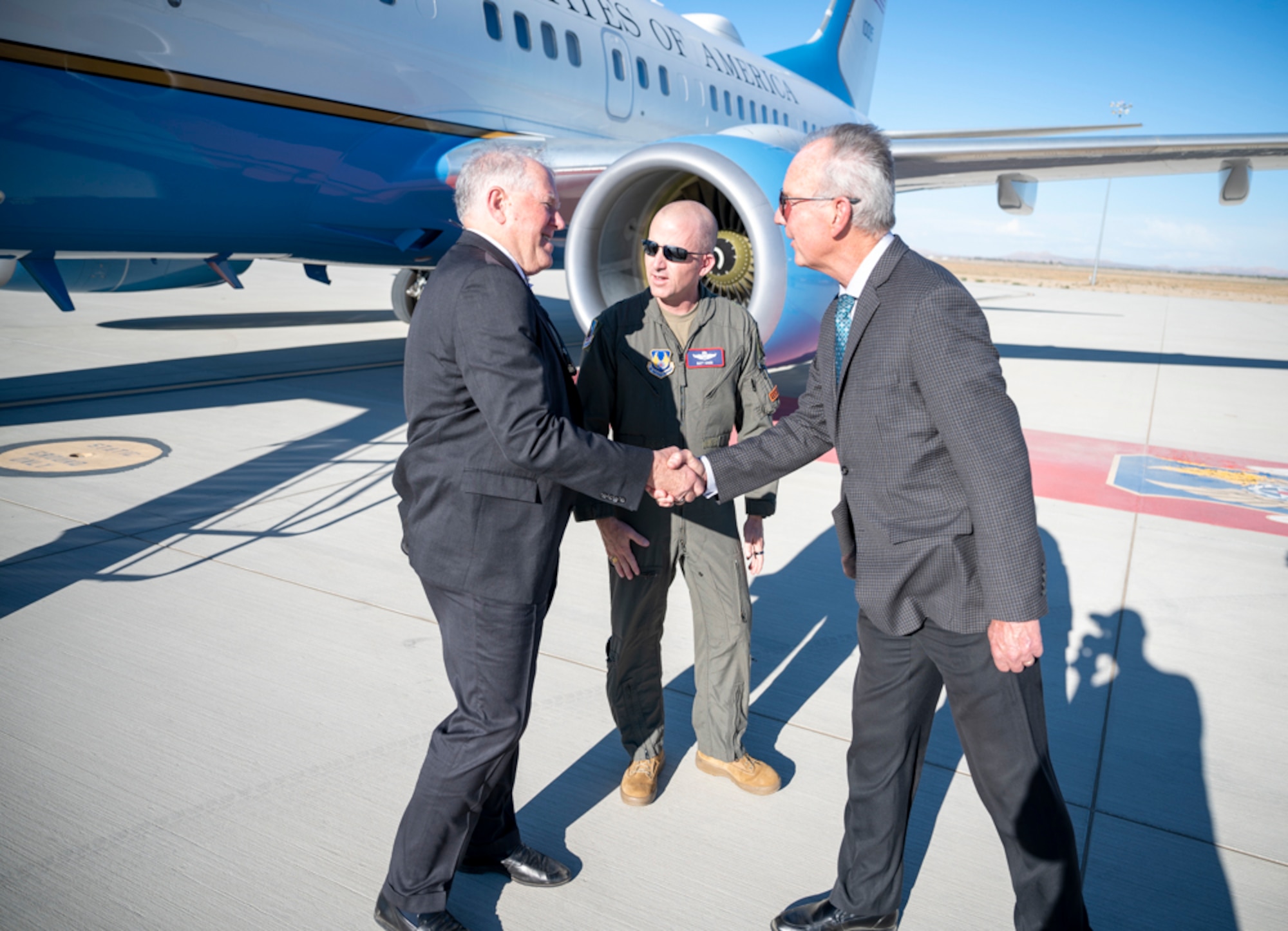 Secretary of the Air Force, Mr. Frank Kendall, shakes hands with David Smith, Edwards 412th Test Wing Operating Location Plant 42 Director, during his visit to see the latest in innovation. (Air Force photo by Adam Bowles)