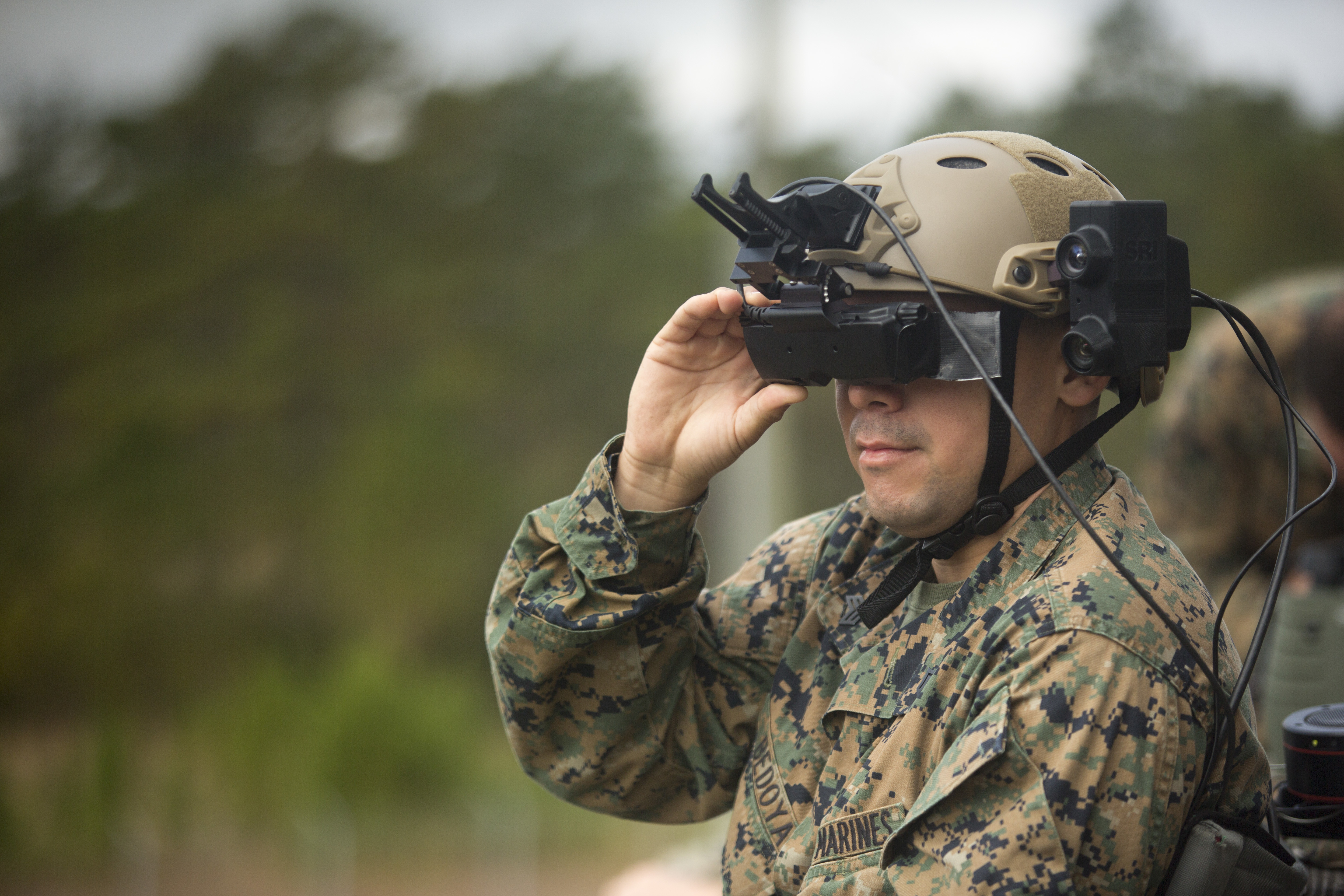 U.S. Marine Corps Sgt. Brayn U. Bedoya, mortarman, 2nd Battalion, 6th Marine Regiment, 2nd Marine Division, utilizes an Augmented Immersive Team Trainer system during the Spartan Emerging Technology and Innovation Week at Observation Point 2 on Camp Lejeune, N.C., Nov. 15, 2016. The Spartan Emerging Technology and Innovation Week showcases new virtual reality equipment used to enhance the training of future Marines.