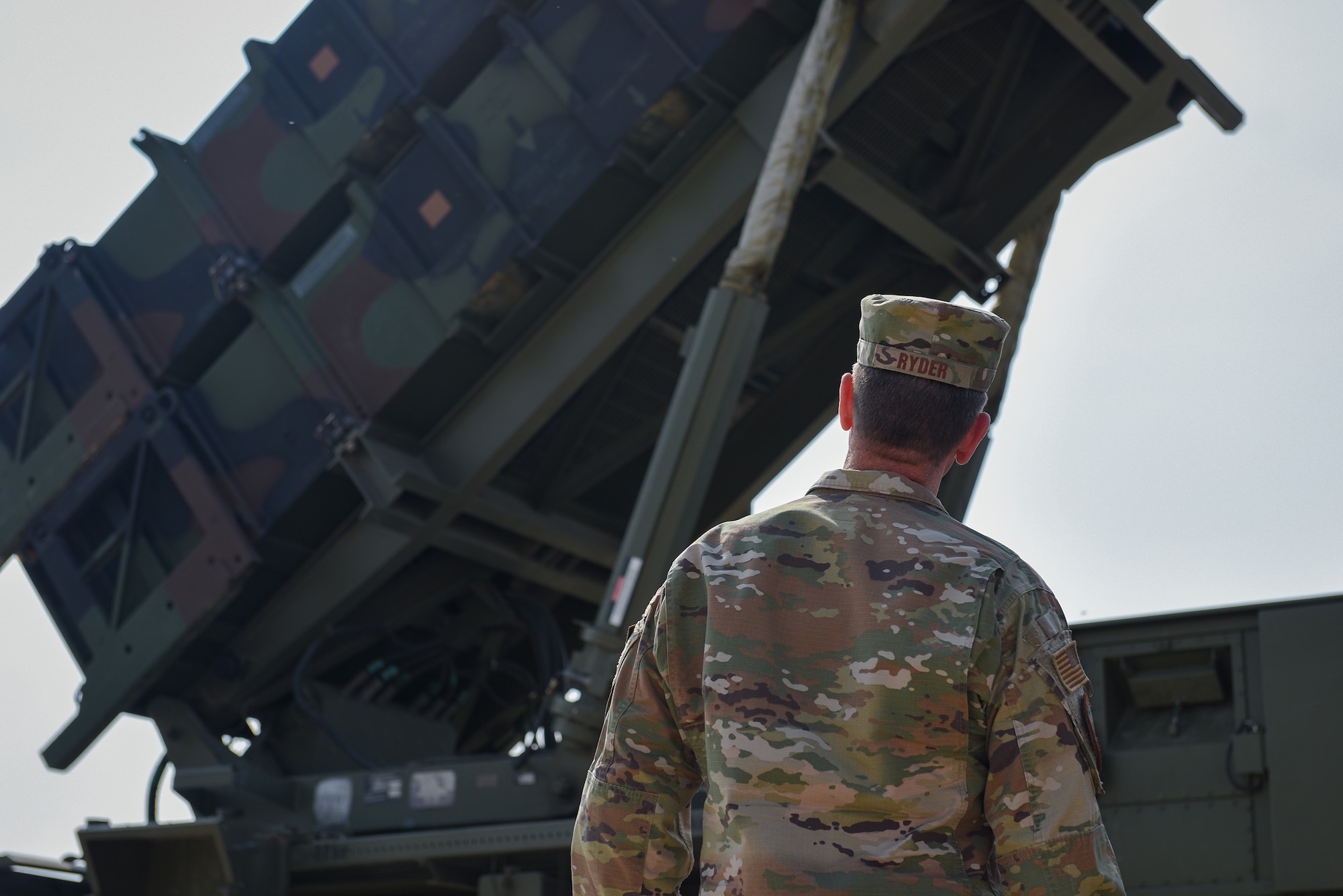 Brig. Gen. Patrick Ryder, Office of the Secretary of the Air Force director of public affairs, looks up at a Spanish Patriot Launcher Station at the Spanish Battery Compound during a visit on Incirlik Air Base, Turkey, Aug. 4, 2022.