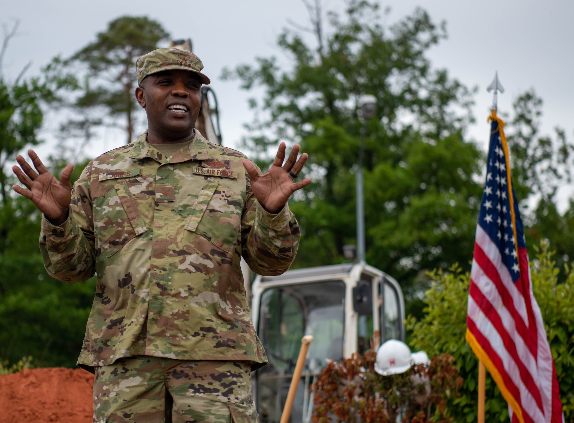 U.S. Air Force Brig. Gen. Otis C. Jones, 86th Airlift Wing commander, explains the significance of the Global Gateway mission during the Gateway to Europe traffic circle ground breaking ceremony at Ramstein Air Base, Germany, Aug. 15, 2022.