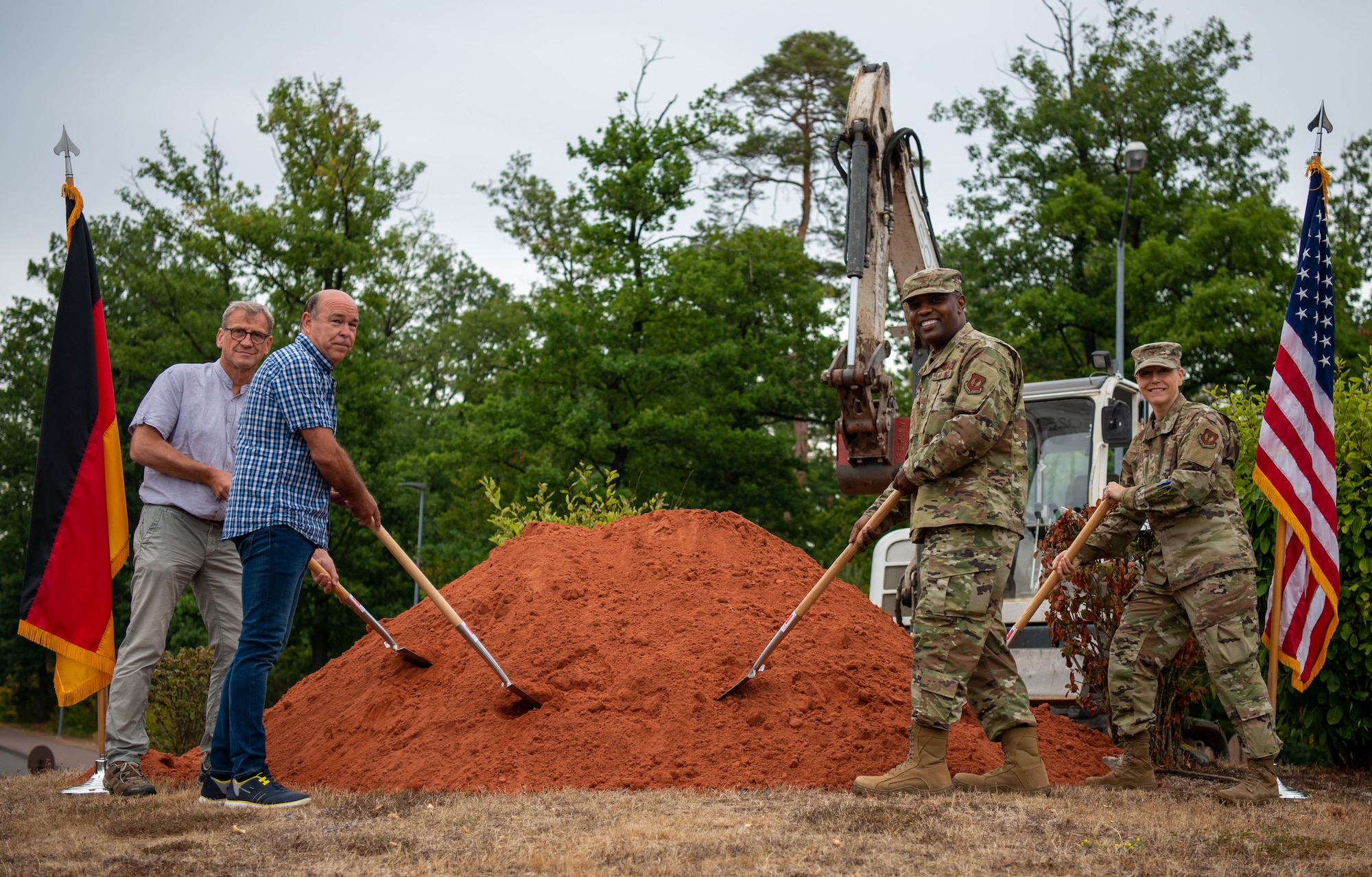 Leaders from across Ramstein Air Base, Germany, prepare to break ground and begin installation of the Gateway to Europe monument at RAB, Aug. 15, 2022.