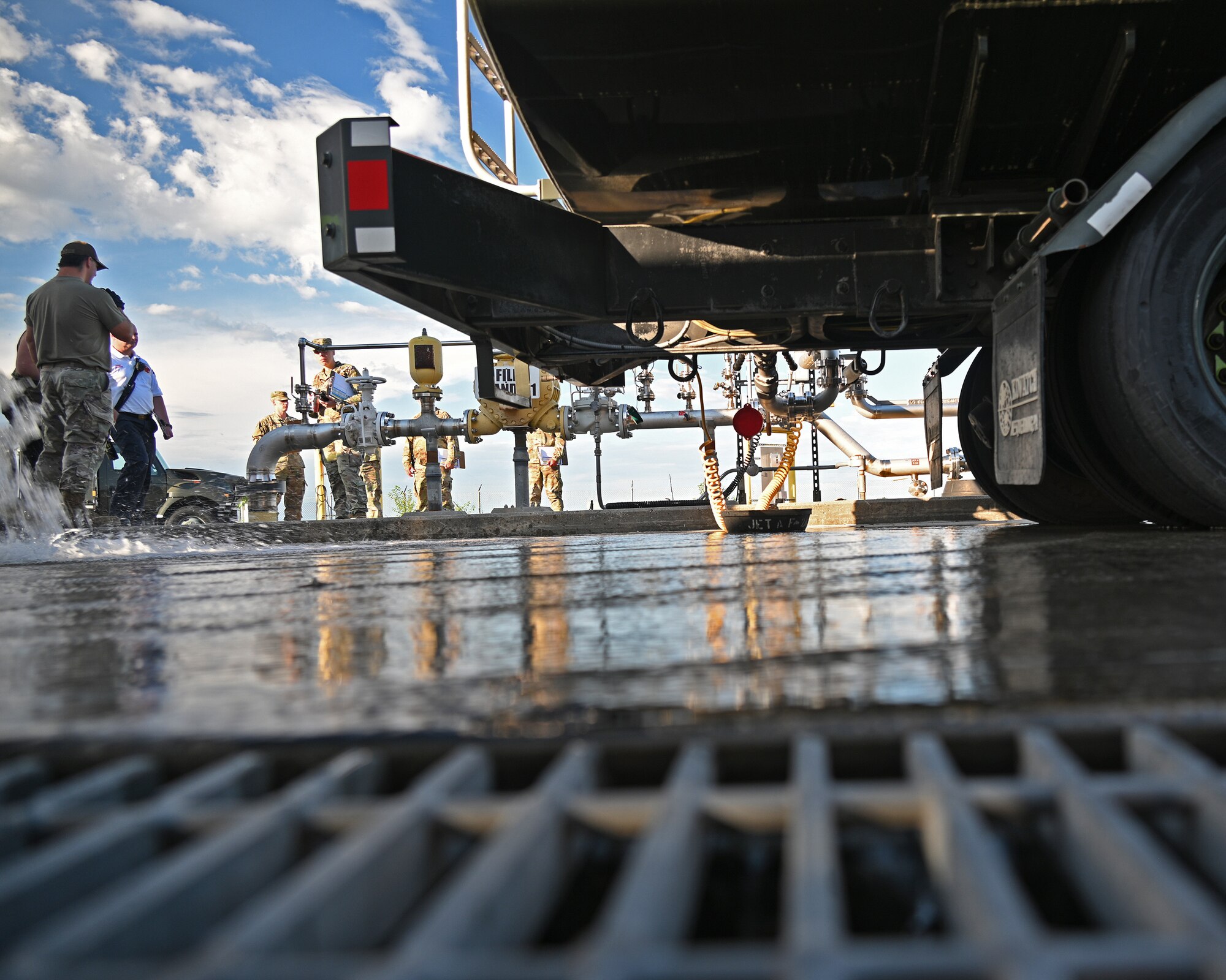 U.S. Air Force Staff Sgt. Jason Zabetakis, a fuels craftsman assigned to the 175th Mission Support Group, observes a simulated fuel spill during a Mission Assurance Exercise at Warfield Air National Guard Base at Martin State Airport, Middle River, Maryland, August 12, 2022.