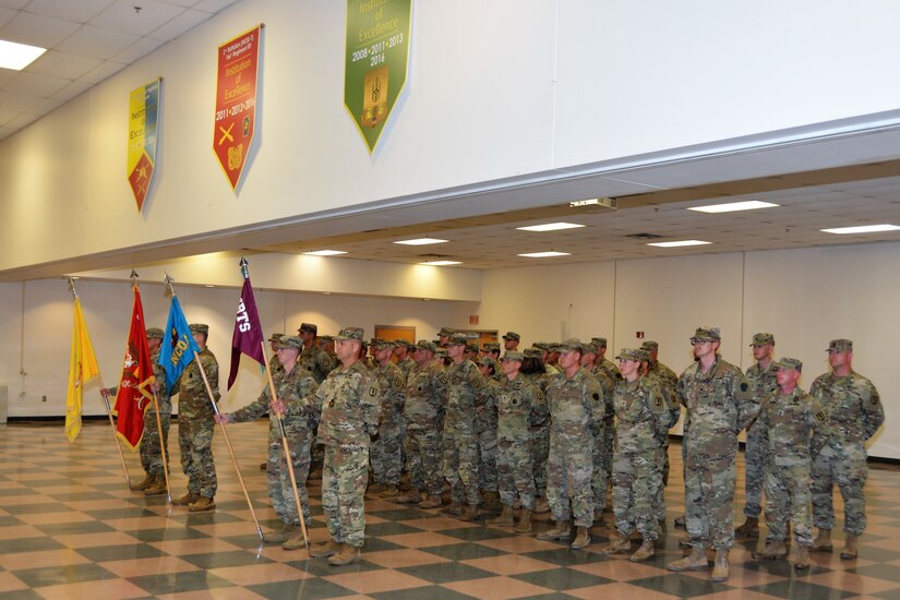 Solders of the 166th Regiment Regional Training Institute stand in formation during a change-of-command ceremony on Aug. 12, 2022, at Fort Indiantown Gap, Pa. Col. Robert Jorgensen Jr. assumed command from Col. Patrick Monahan, who is retiring, during the ceremony. (Pennsylvania National Guard photo by Brad Rhen)
