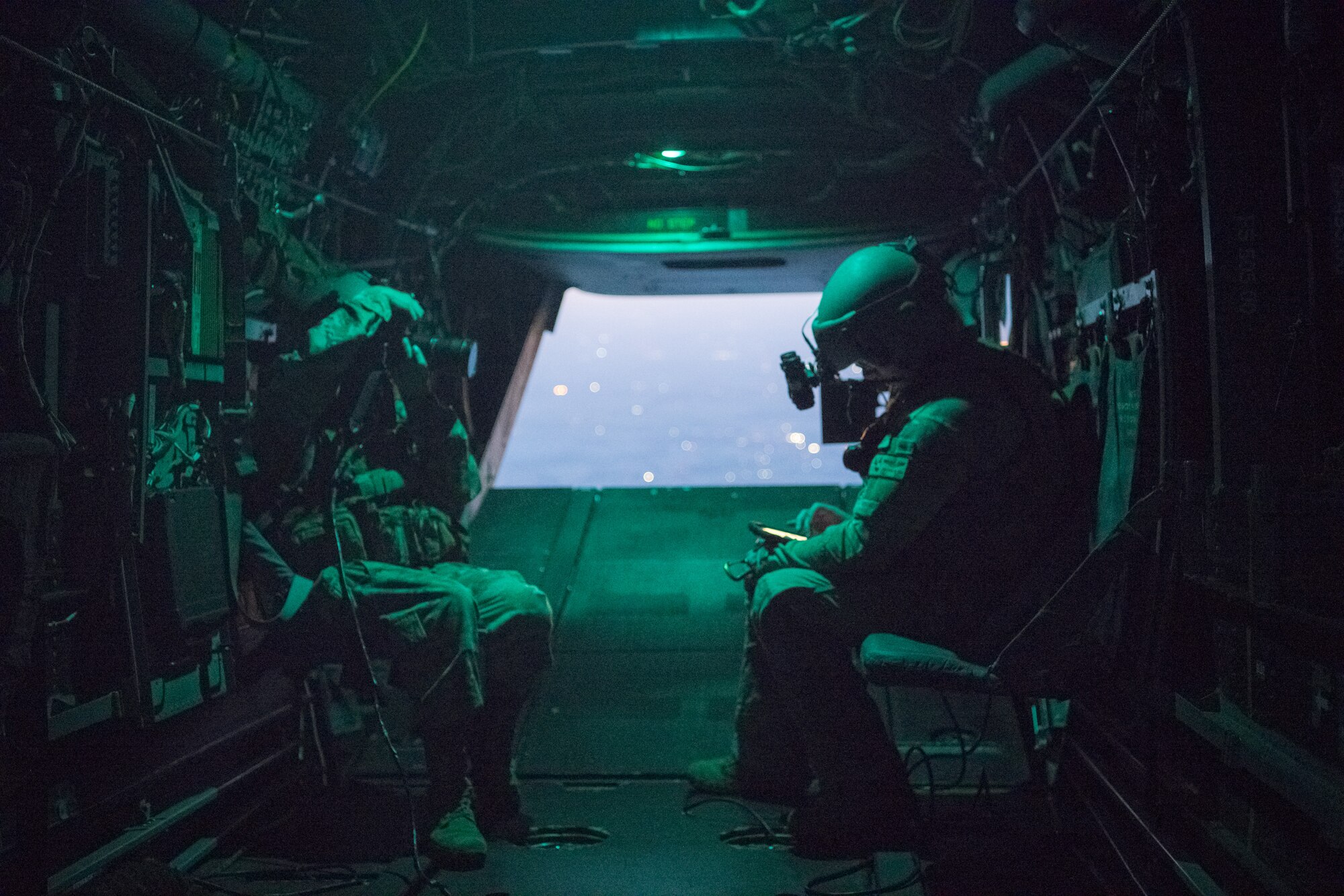 person on aircraft photographs another aircrew member