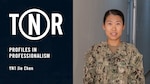 U.S. Navy Yeoman 1st Class Jie Chen, a Navy Reserve Sailor from New York and the administration lead petty officer of the N4 Supply Department on Camp Lemonnier, Djibouti (CLDJ), poses for a portrait.