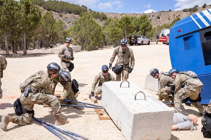 Utah National Guard service members with the Region VIII Homeland Response Force, in cooperation with Utah Task Force 1, conduct search-and-extraction training on the new Collapsed Structure Venue Site during a readiness evaluation exercise at Camp Williams, Utah, August 3-7, 2022.