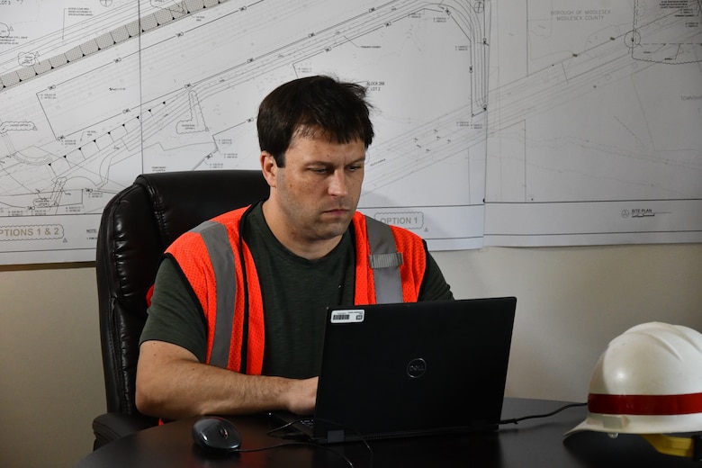 Alek Petersen, project manager for the Green Brook Flood Risk Management project, works at the Green Brook Field Office in Middlesex, New Jersey.