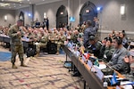 Attendees introduce themselves during the Senior Enlisted Leader International Summit in Arlington, Va., Aug. 1, 2022. The summit is hosting senior enlisted leaders from 54 countries to reinforce partnerships between military services.