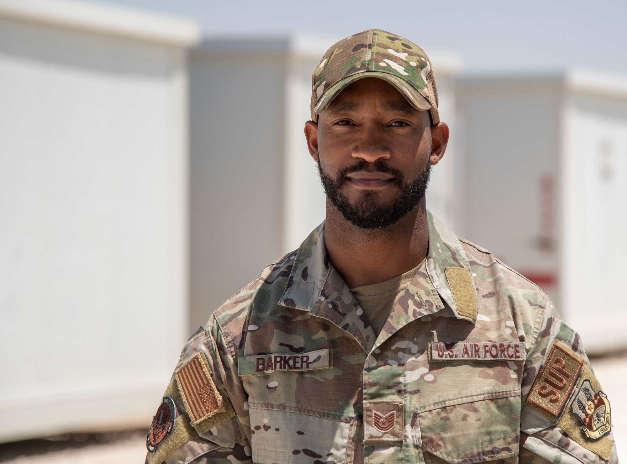 Portrait of Tech. Sgt. Mychel Barker at an undisclosed location, August 1, 2022. Barker is president of Red Tail Shield, a peer to peer organization for members of the 332d Air Expeditionary Wing. He attended the Department of Defense Men's Sexual Assault Prevention and Response Campaign. (U.S. Air Force photo by: Tech. Sgt. Jim Bentley)