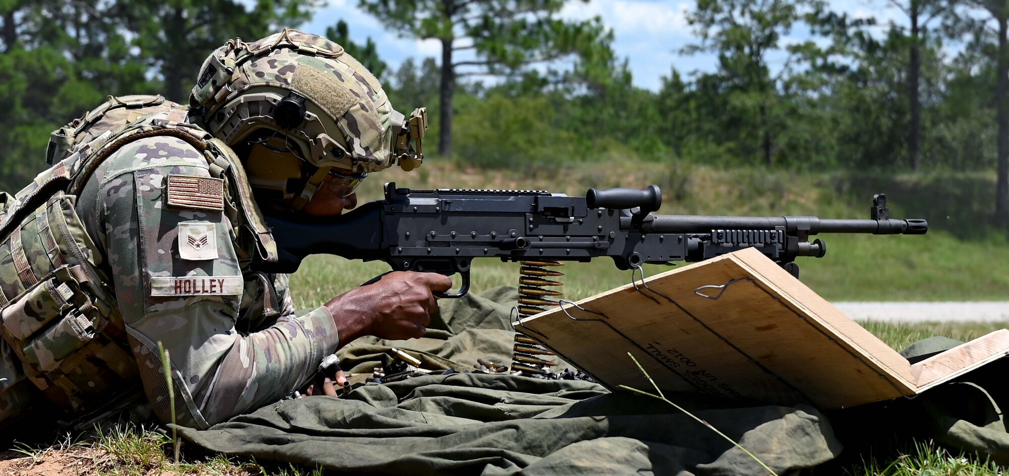 a man fires a weapon