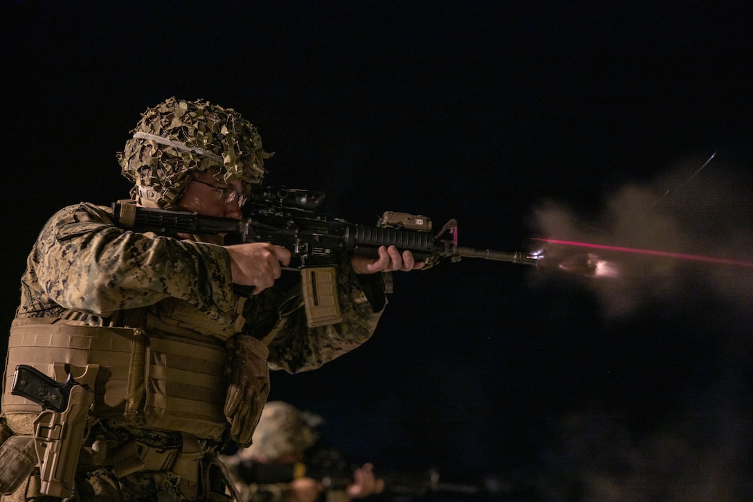 U.S. Marine Corps 1st Lt. Robert Rogers, a combat engineer officer with 3rd Maintenance Battalion, 3rd Sustainment Group, 3rd Marine Logistics Group, fires an M4 carbine during a table three through six and combat marksmanship program range at Camp Hansen, Okinawa, Japan, Aug. 16, 2022. The purpose of the range was to improve the battalion's organic combat marksmanship capabilities and to train the core position safety officers for subsequent company ranges. 3rd MLG based out of Okinawa, Japan, is a forward-deployed combat unit that serves as III Marine Expeditionary Force’s comprehensive logistics and combat service support backbone for operations throughout the Indo-Pacific area of responsibility.