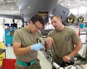 Airman 1st Class Michael Ritter applies lubricant to an O-ring while Staff Sgt. Joshua Fye observes his work at Selfridge Air National Guard Base, Michigan, Aug. 14, 2022