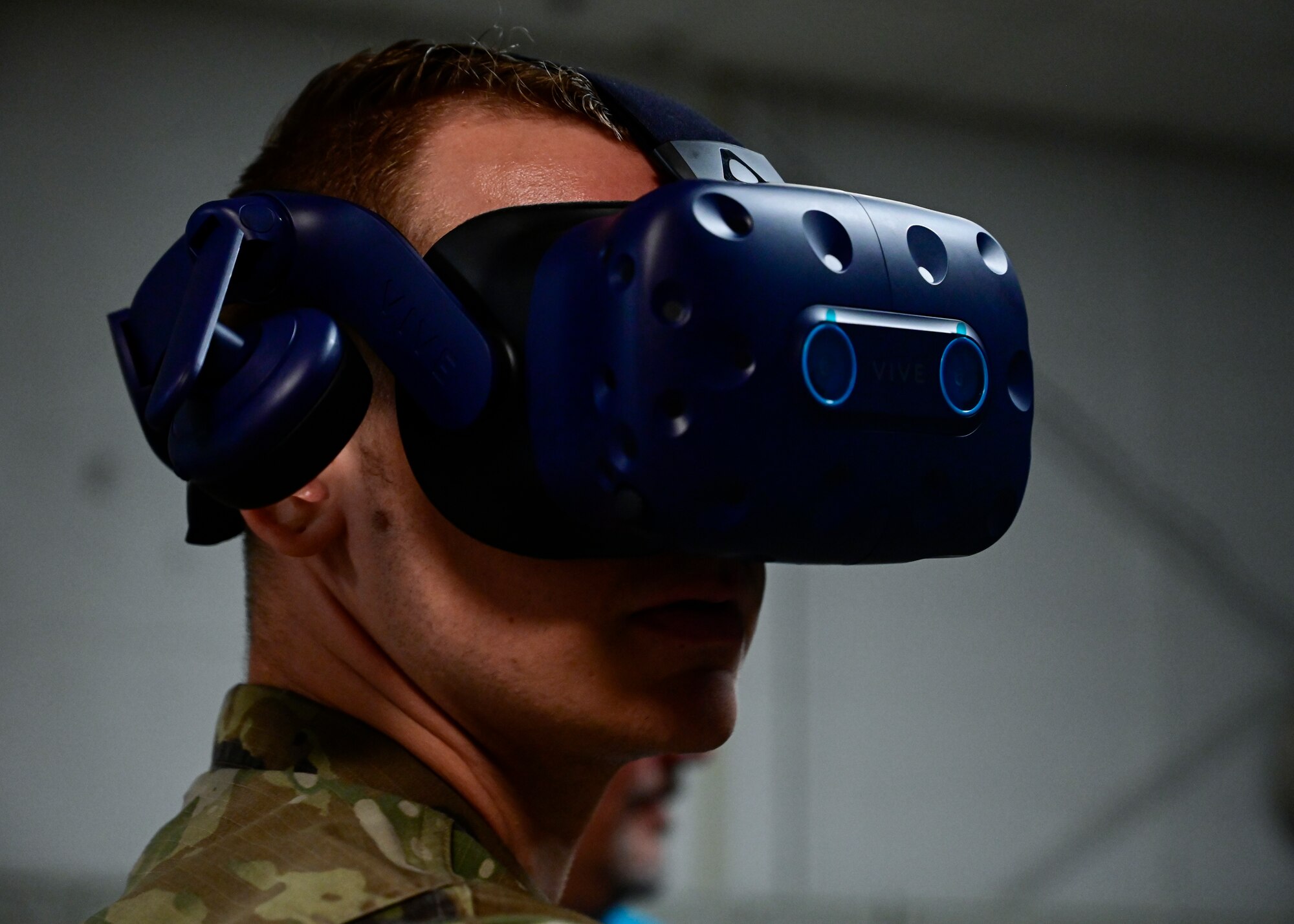 An Airman tests a virtual reality headset.