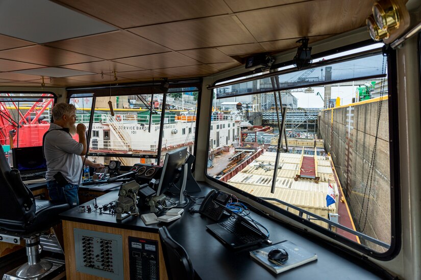 Crewmembers with the U.S. Army Corps of Engineers Medium Capacity Fleet perform repairs at the New Cumberland Locks and Dam on the Ohio River in Moraine, Ohio.