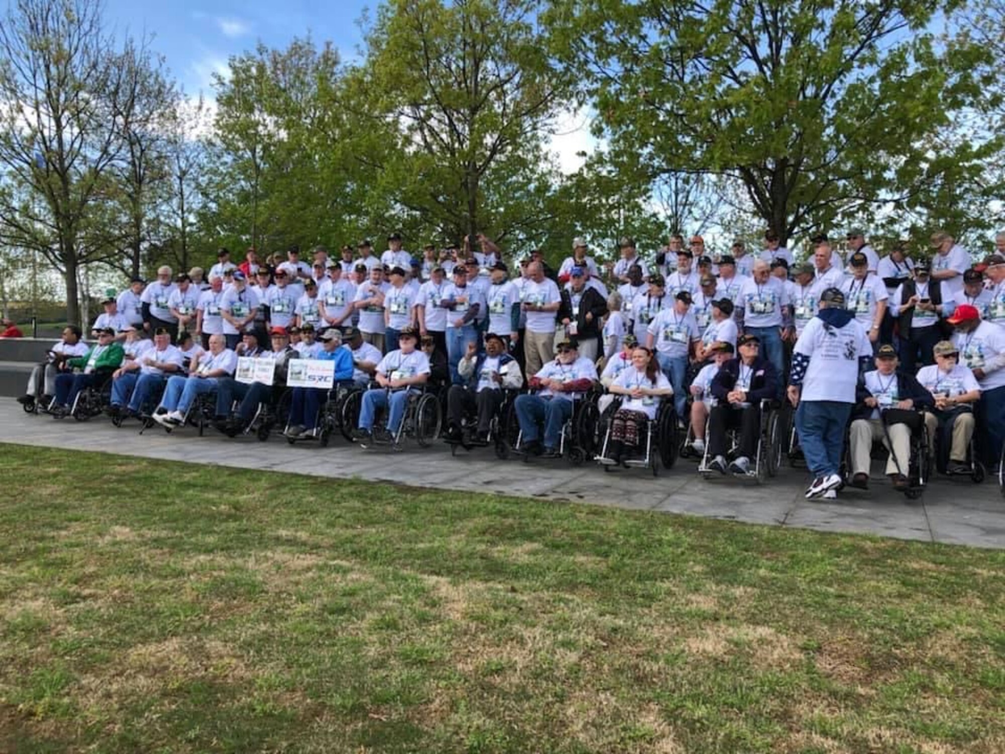 Veterans with Honor Flight Dayton pause for a group photo while touring memorials in Washington.
