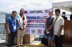 (From left) Kalayaan Municipal Disaster Risk Reduction and Management Officer Dennis Abacial, Palawan Governor Socrates, U.S. Embassy Acting Public Affairs Officer Lewis, and Provincial Legal Officer Atty. Joshua Bolusa attend the turnover ceremony of U.S.-donated tents and supplies to augment the Palawan local government’s shelter, medical, and logistical capacity during crises.